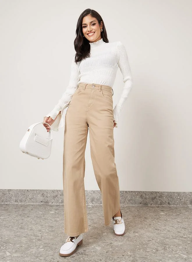 Styli Textured High Neck Fitted Knit Top with Flute Sleeve